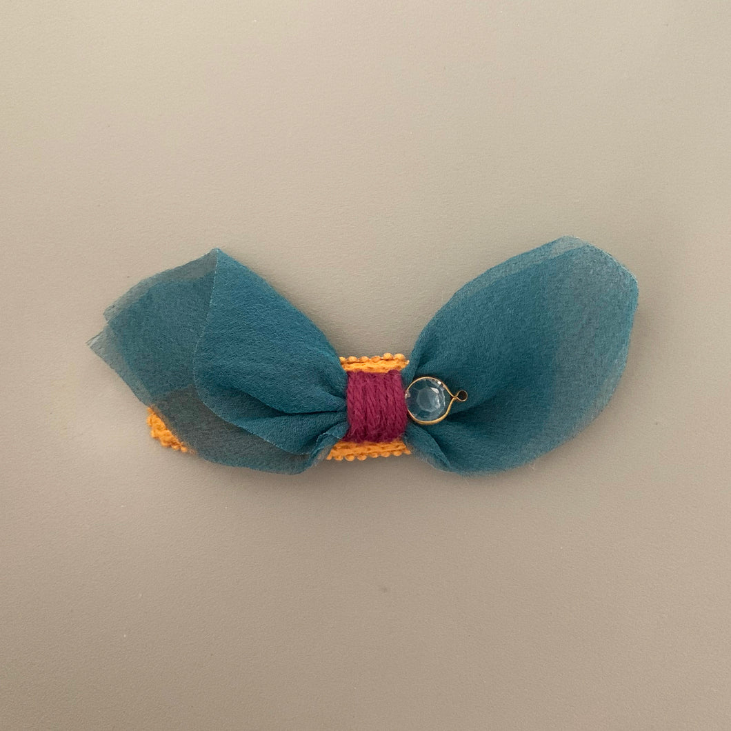 Knit pom pom hair slide (teal butterfly)